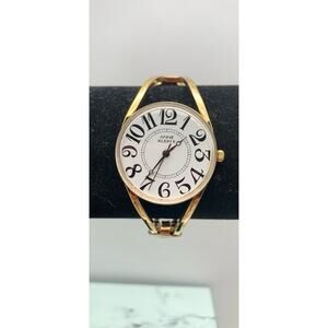 Anne Klein Women's Gold Toned Cuff Band Analog Watch